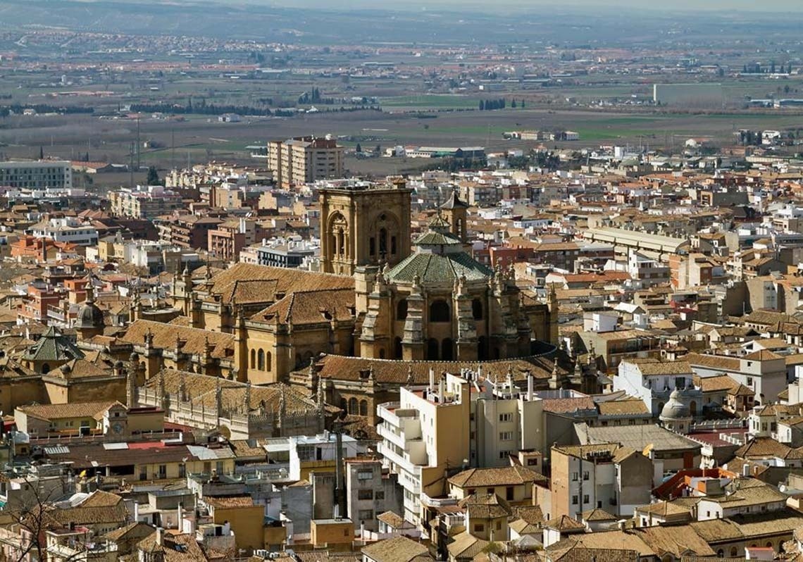 a very ornate building with columns and arches