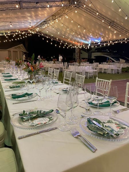 a long table is set up for a wedding reception