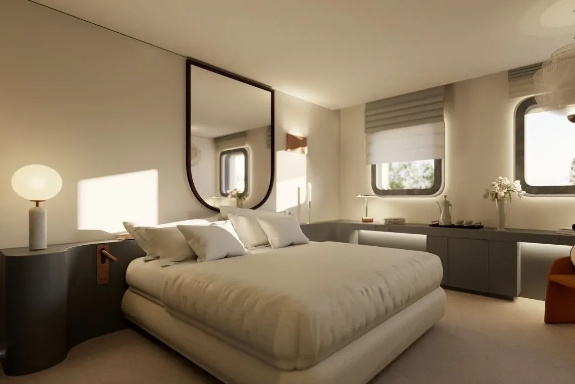 Luxury hotel bedroom with plush bed, large mirror, and scenic windows. Moon & Sun: Corpo