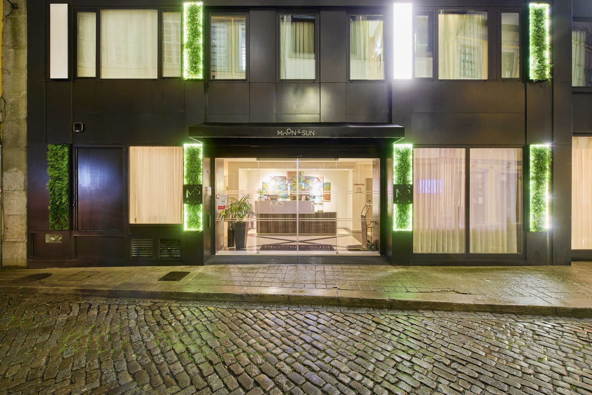 the entrance to a hotel with the word n on it