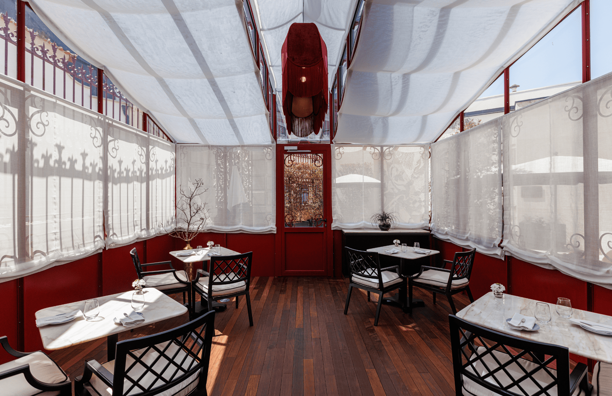 a woman is squeezing a lemon over oysters