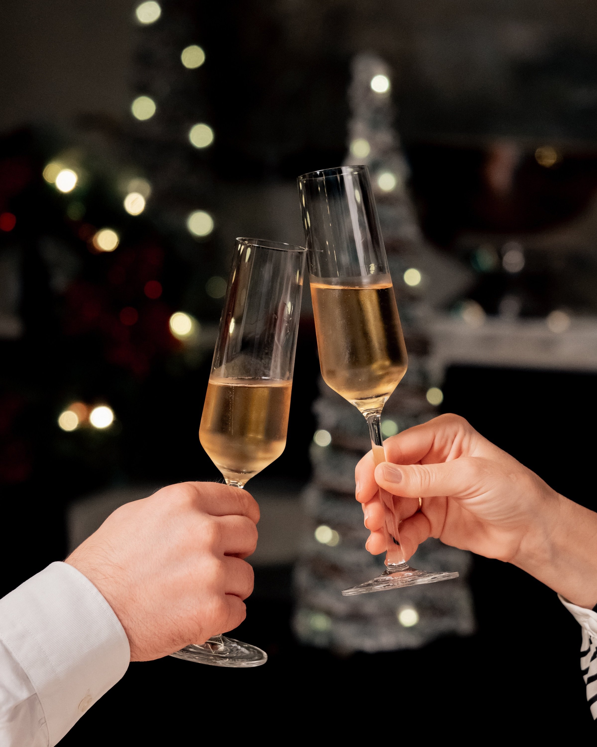 a sparkler is lit up in the dark with a yellow background