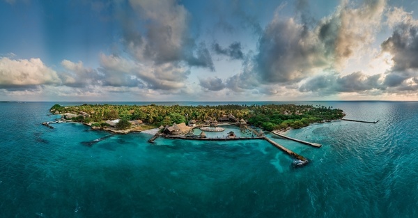an aerial view of a small island in the middle of the ocean
