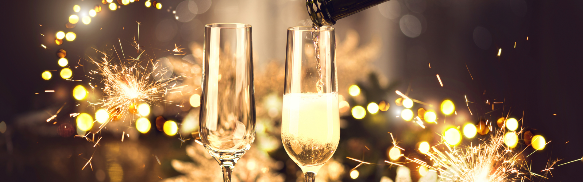 a bunch of fireworks are going off in the night sky