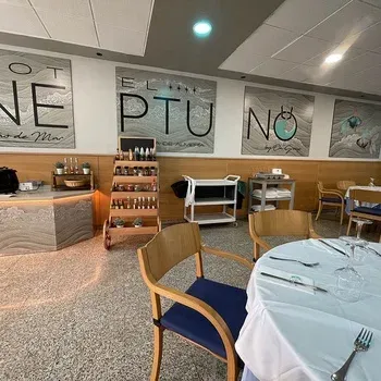 Hotel Neptuno: modern dining room with mural art and set tables.