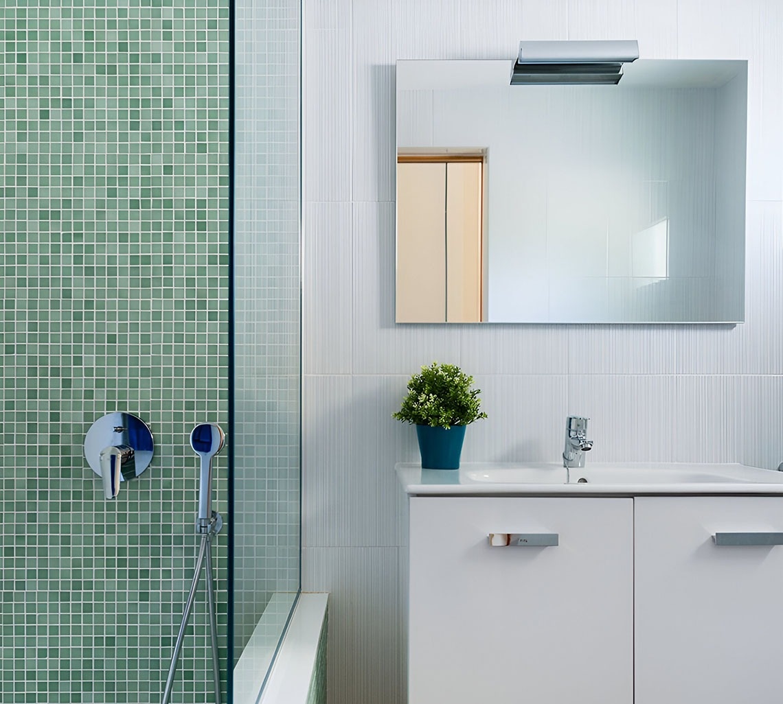 a woman wearing a mask and goggles is swimming in the ocean