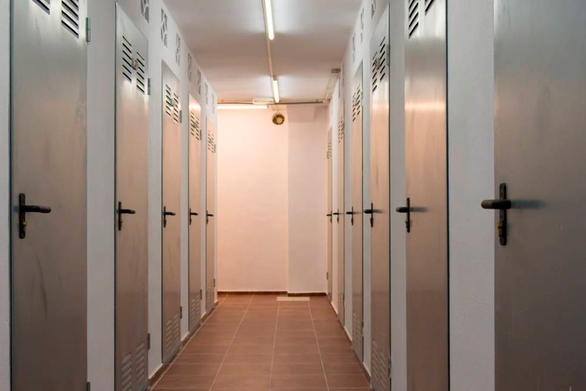 a woman wearing a mask and goggles is swimming in the ocean