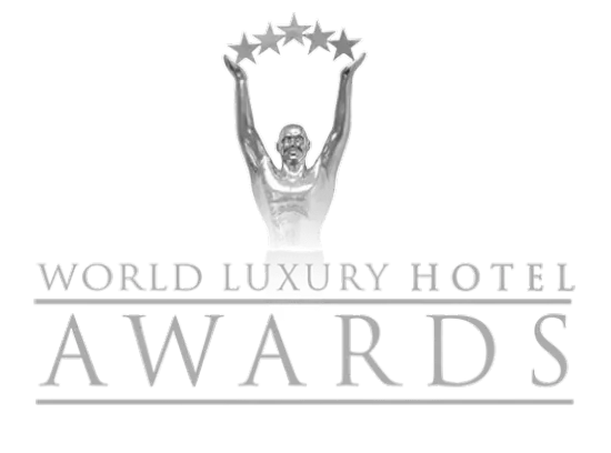 Plantilla Baseline V9: Trofeo de los World Luxury Hotel Awards con figura y estrellas.