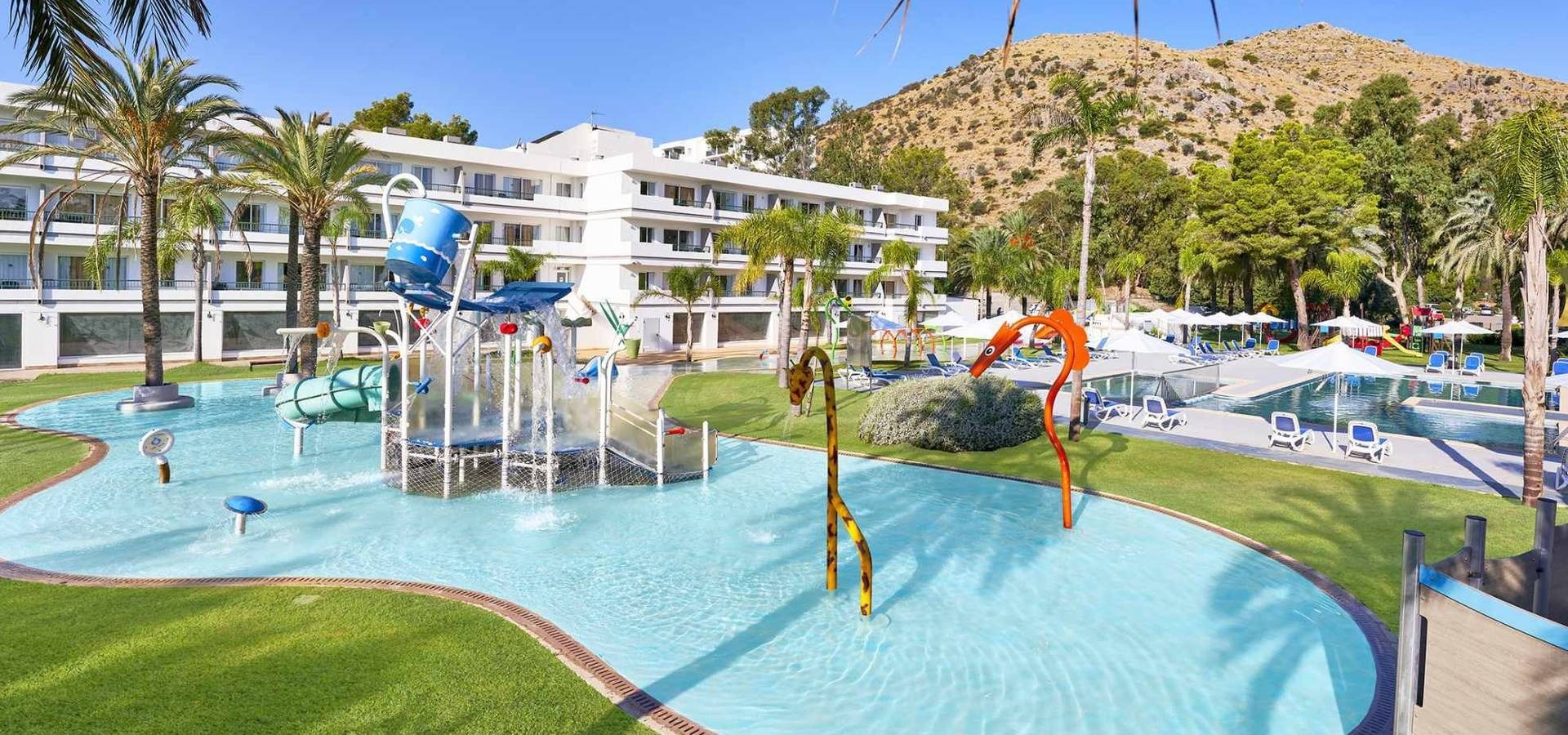 two drinks on a table in front of a pool table