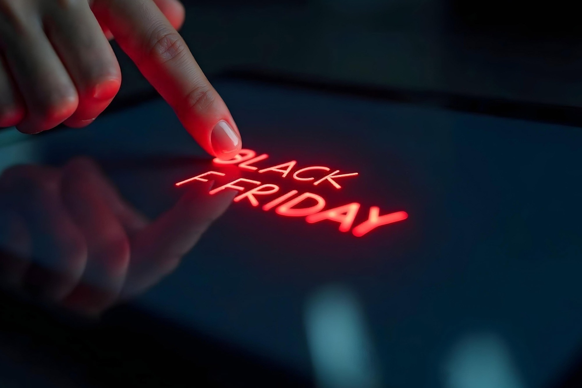 a woman standing on a cliff overlooking the ocean