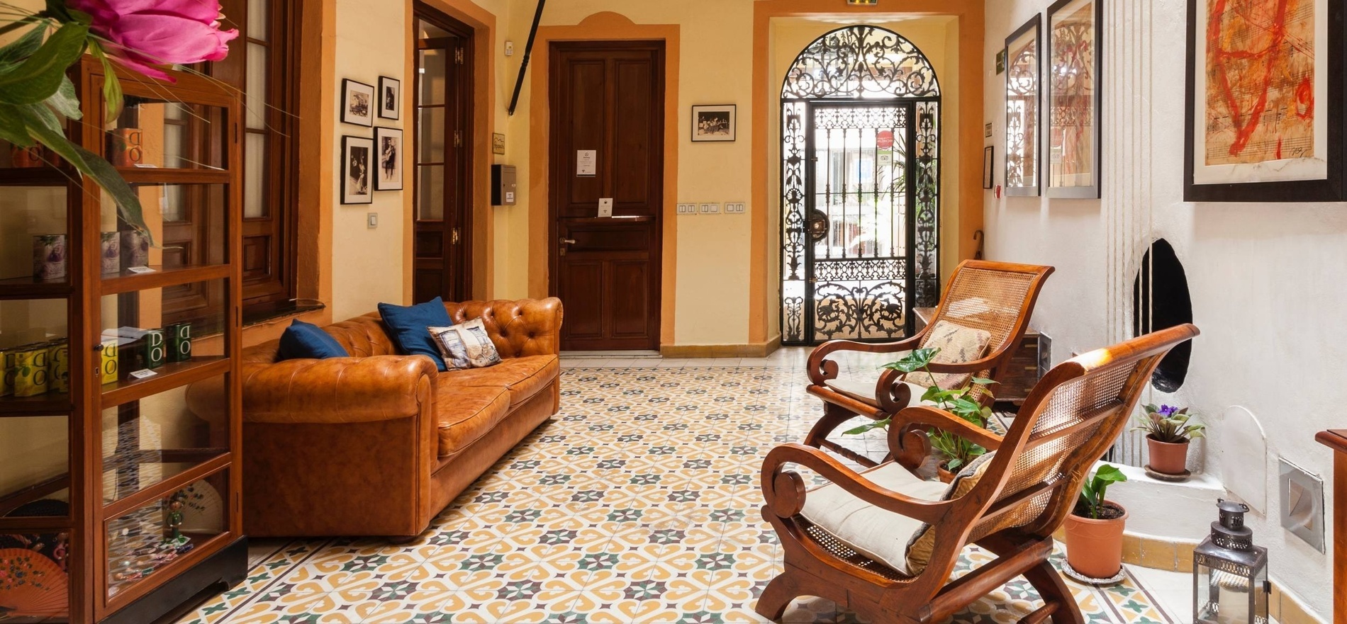 a hallway with a couch and chairs and a sign that says ' a ' on it