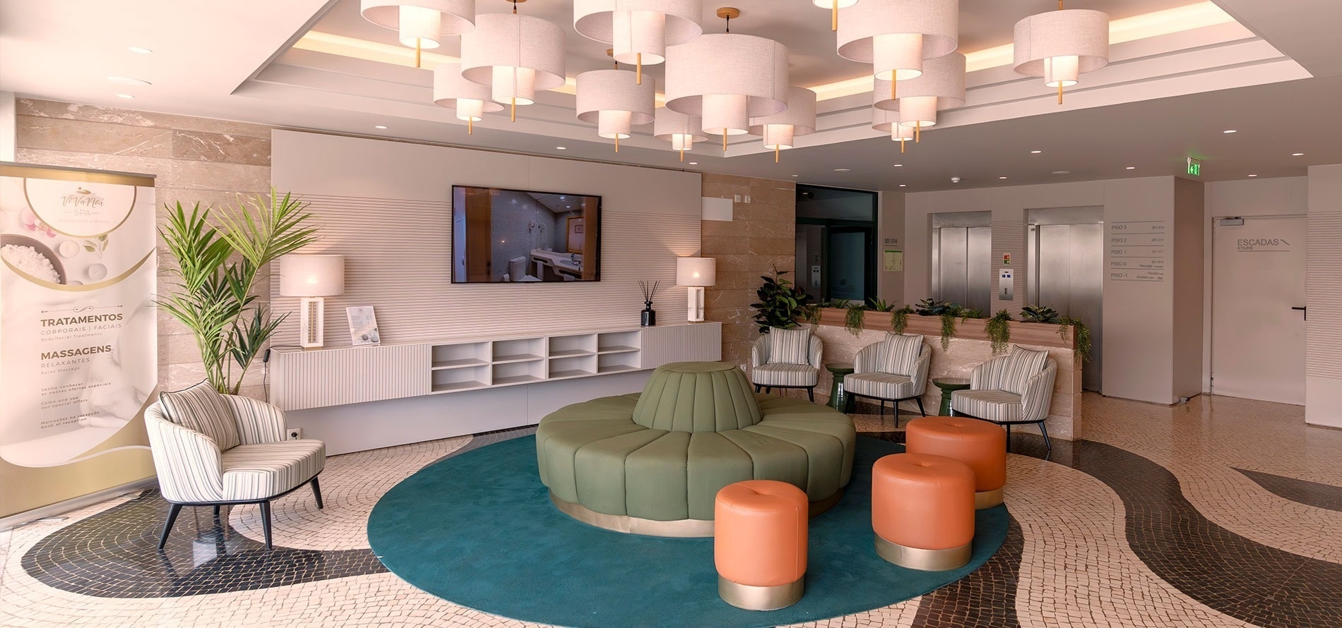 a waiting room with a sign that says " tratamentos " on it