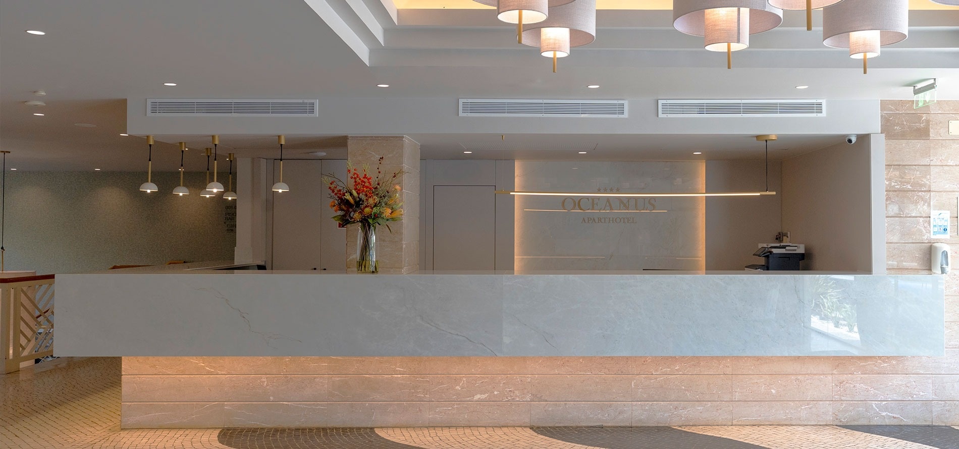 the front desk of the oceanis hotel