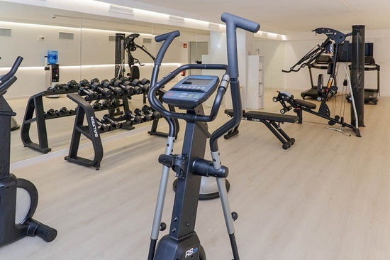 an elliptical in a gym that says fs2 on it