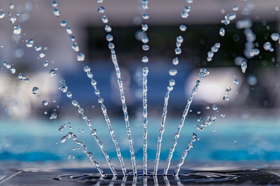 a fountain with water splashing out of it