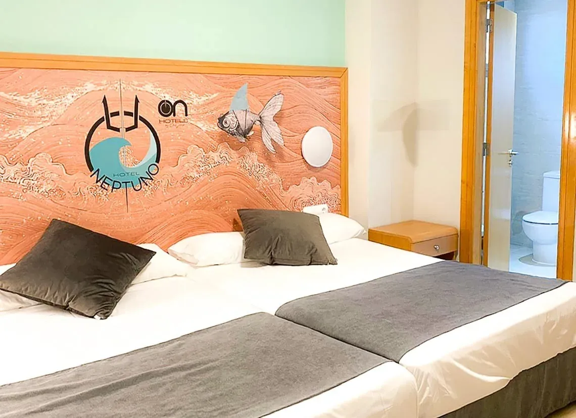 Double room at Hotel Neptuno Roquetas de Mar Almeria | ON Hotels Group, featuring marine-themed decor.