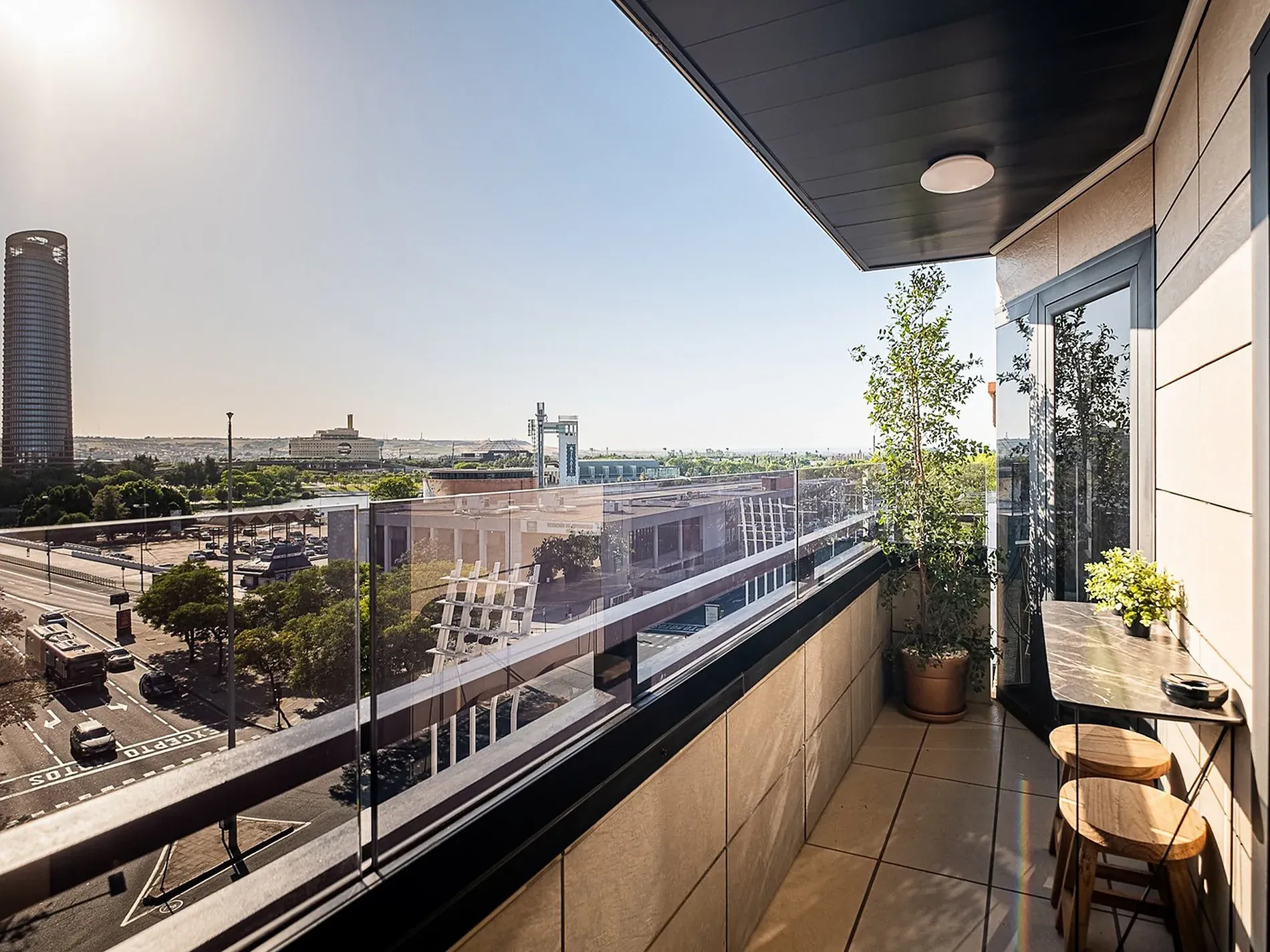 Balcony view of Seville skyline from ON Suites Seville | Apartments only adults.