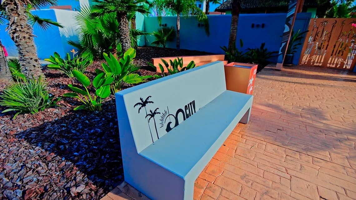 a bench with the word city on it