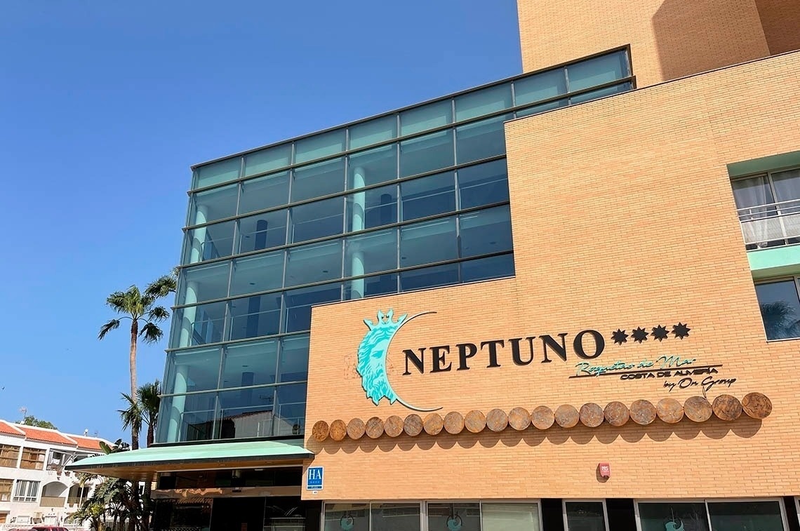 a large building with the word neptune on it