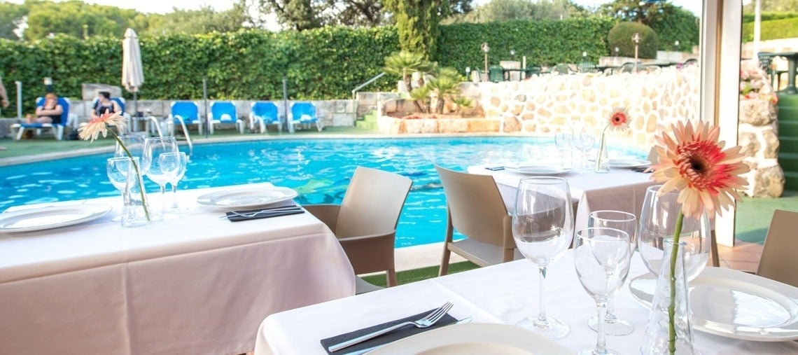 Terrace overlooking the pool of the Ona Aucanada hotel in the North of Mallorca