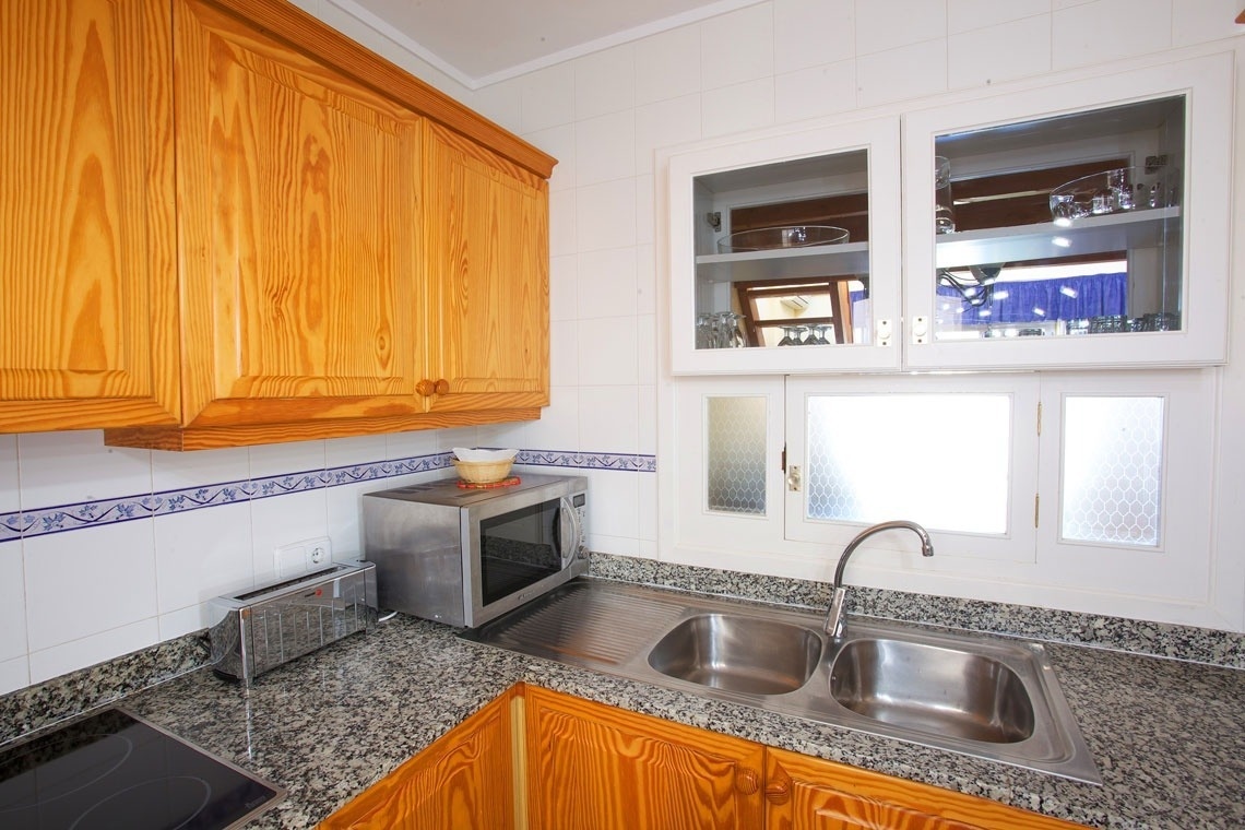 Kitchen detail of the Ona Cala Pi hotel apartment, in Majorca