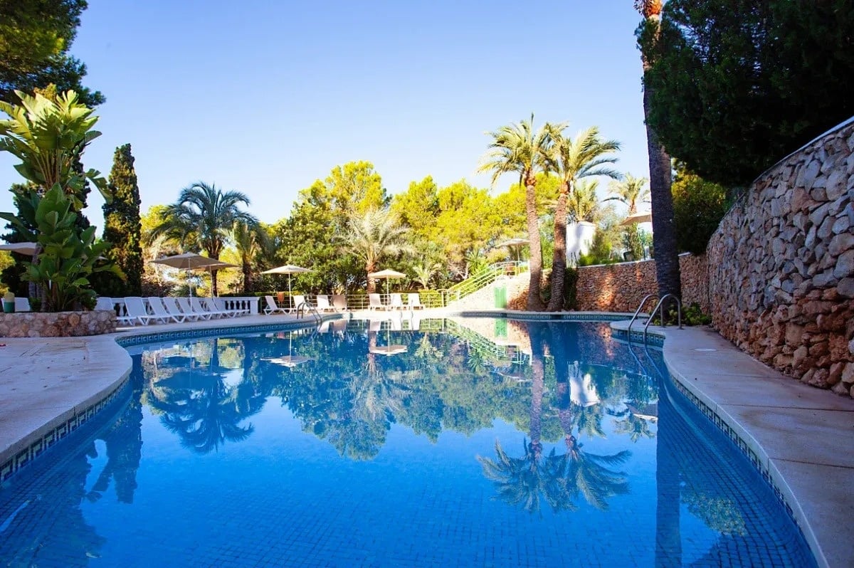 Outdoor pool at dusk of the Ona Cala Pi hotel, in Mallorca