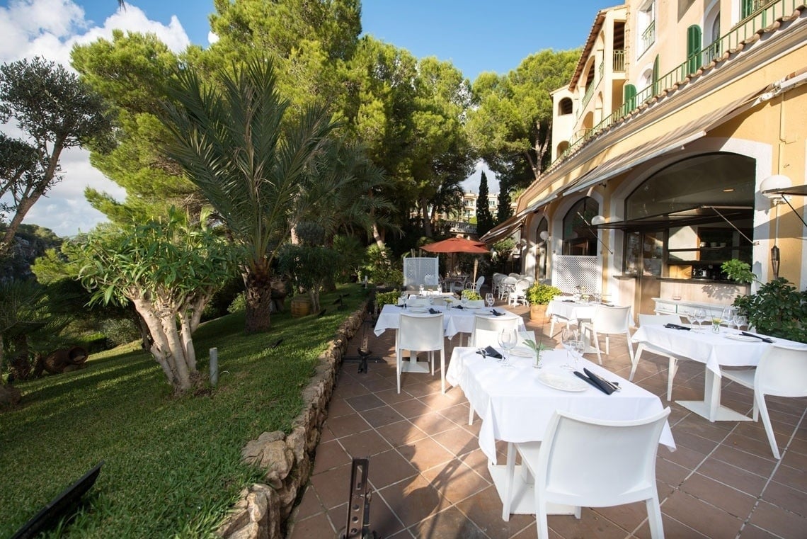 Terrace overlooking the garden of the Ona Cala Pi hotel, in Majorca