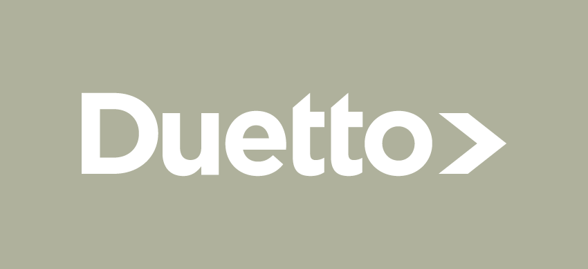 un logotipo de duetto sobre un fondo gris