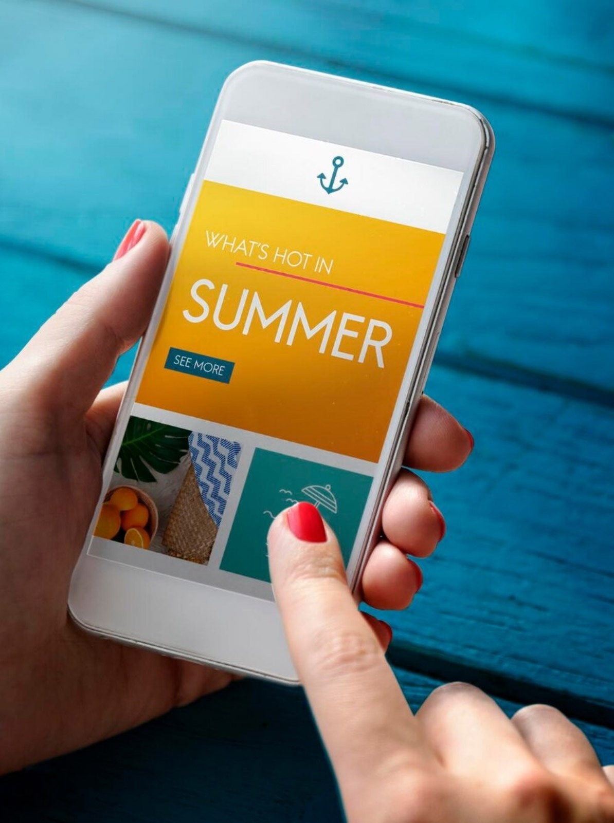 a person holding a cell phone that says what 's hot in summer