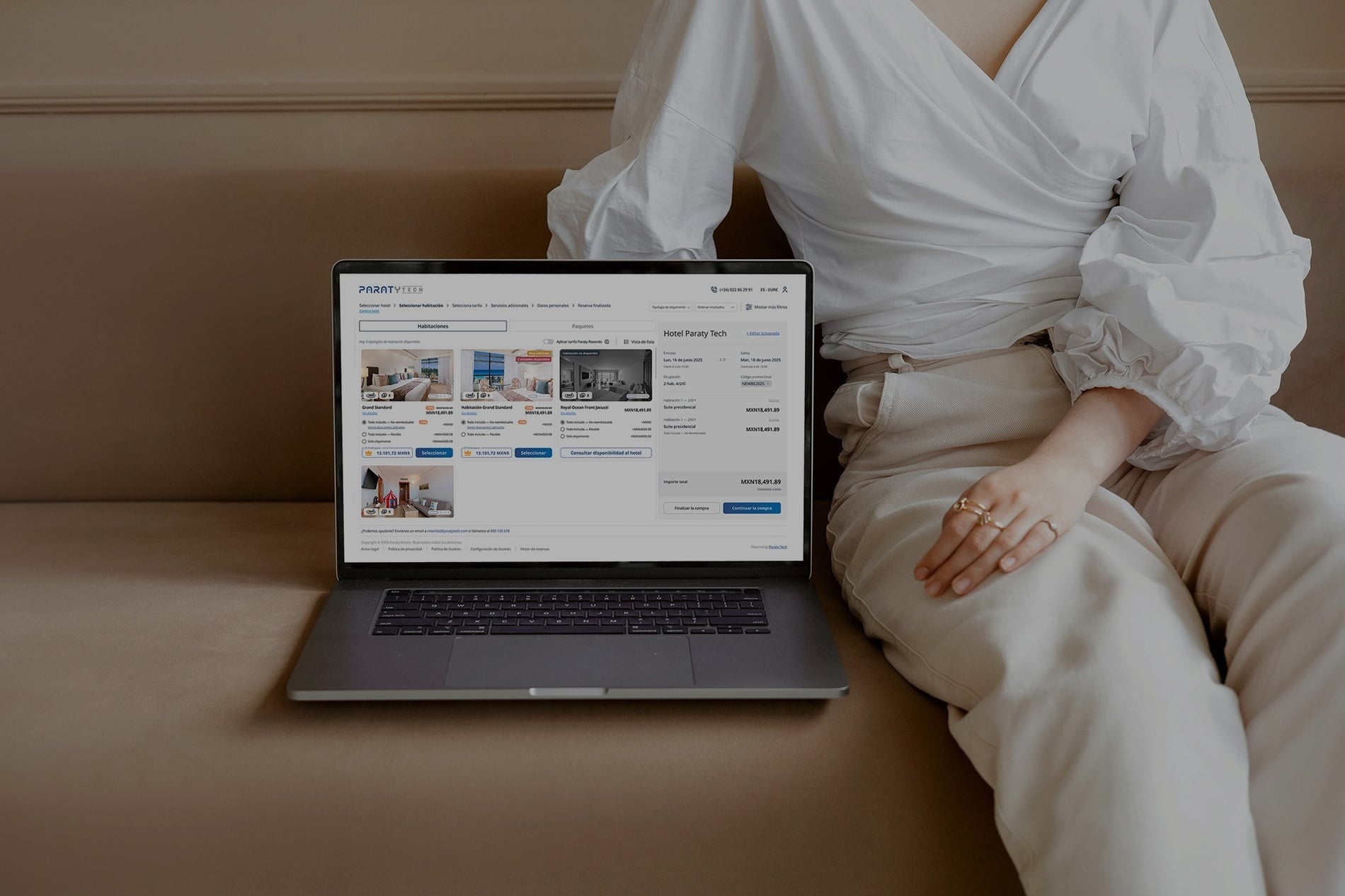 a computer screen displays a website for a hotel