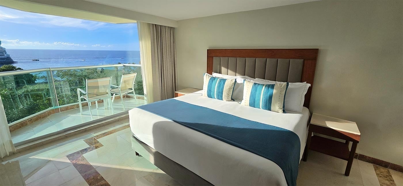 Habitación de lujo en Park Royal: Corpo con vista al mar y balcón privado.