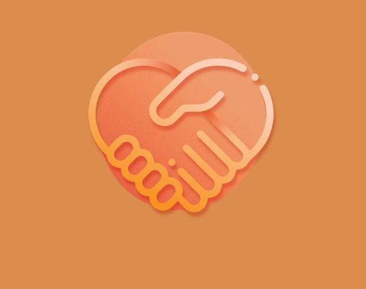 a handshake in the shape of a heart on a brown background