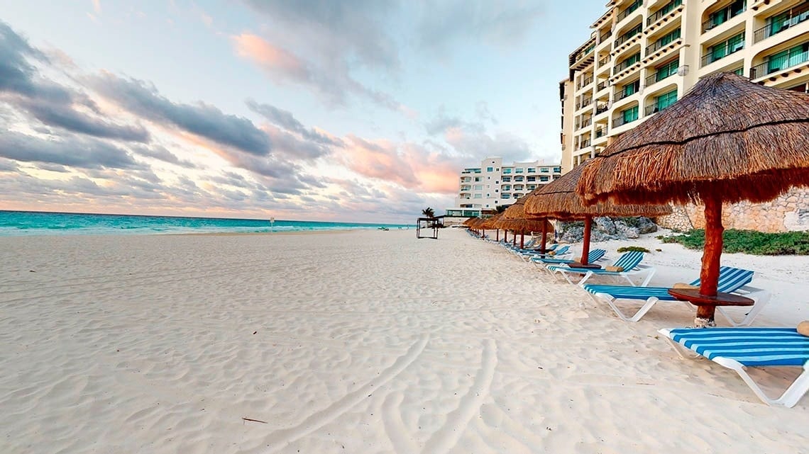 Detail of hammocks and beach of the Grand Park Royal Cancun Hotel in the Mexican Caribbean