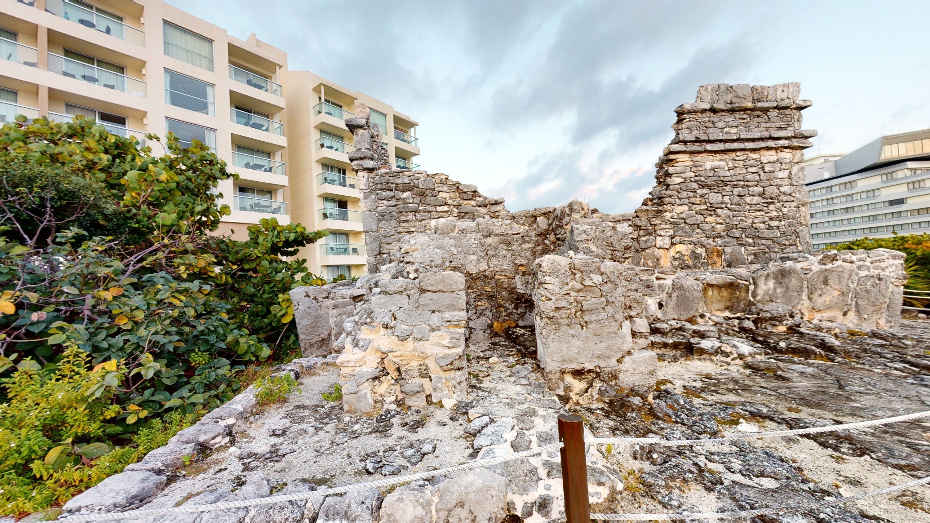 Group of people visiting Mayan ruins at Park Royal Beach Cancun, Mexican Caribbean