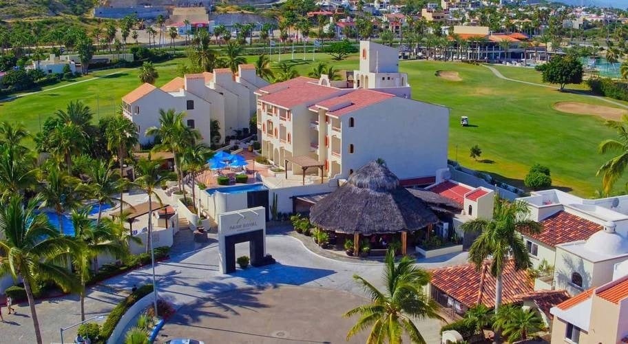 General view of the entrance, outdoor pools and facilities of Homestay Los Cabos in Baja California Sur