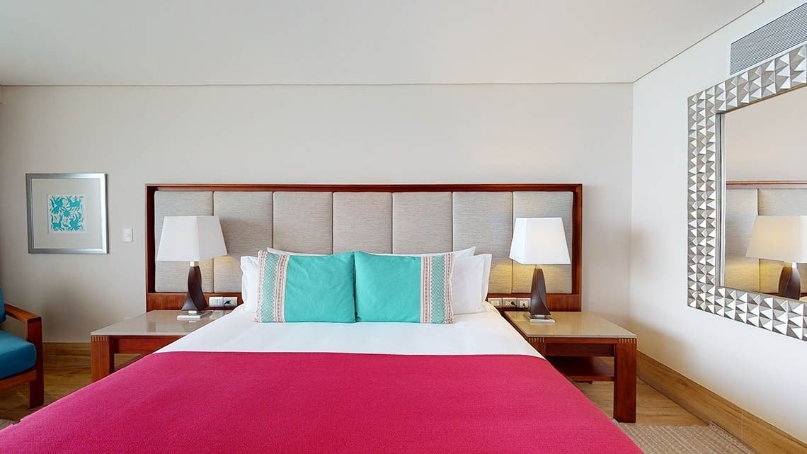 Cabecero de cama de habitación acogedora del Hotel Grand Park Royal Puerto Vallarta