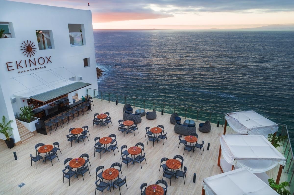 an aerial view of ekinox bar & terrace overlooking the ocean