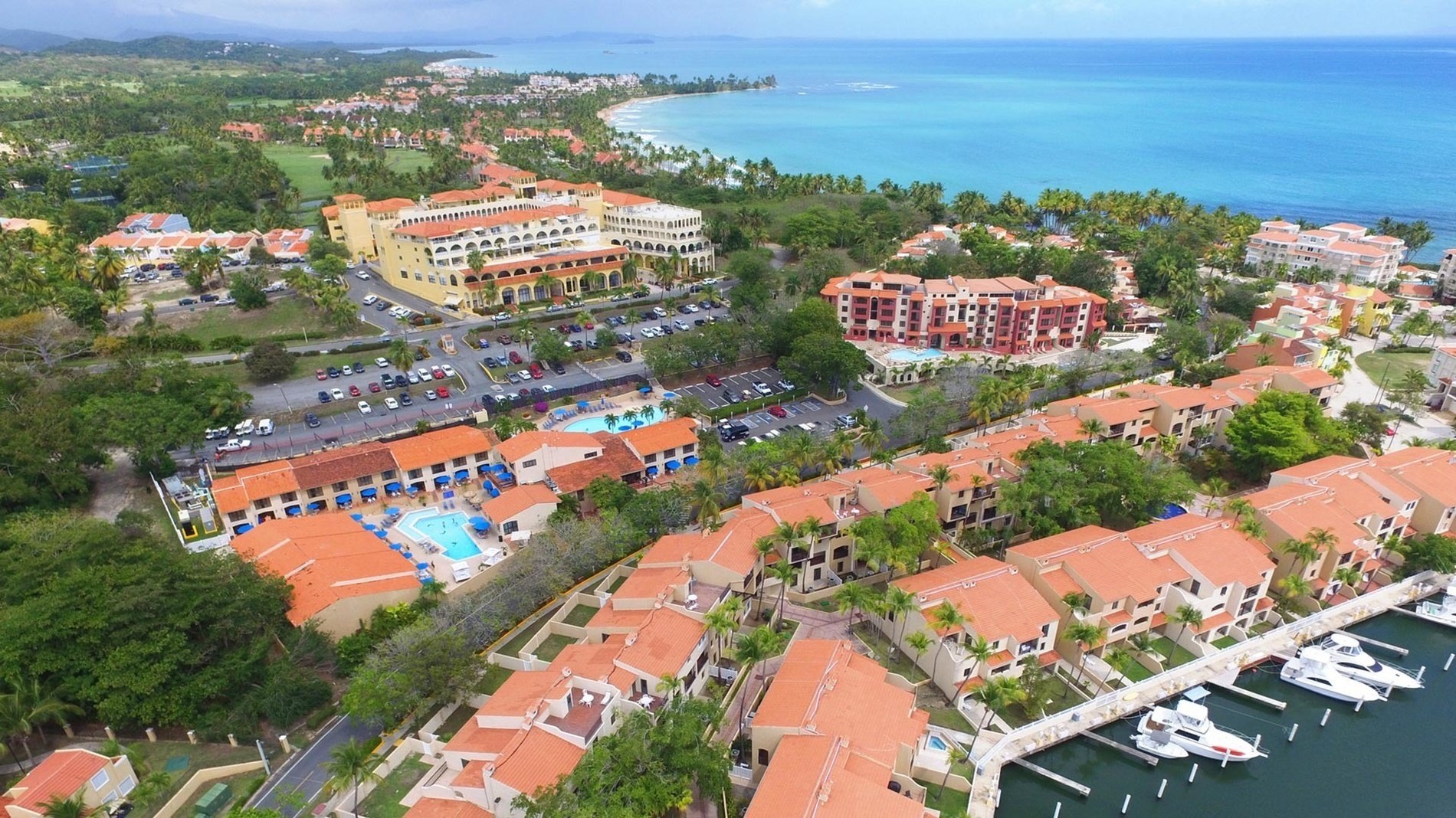 an aerial view of a marina with a sign that says travelers choice