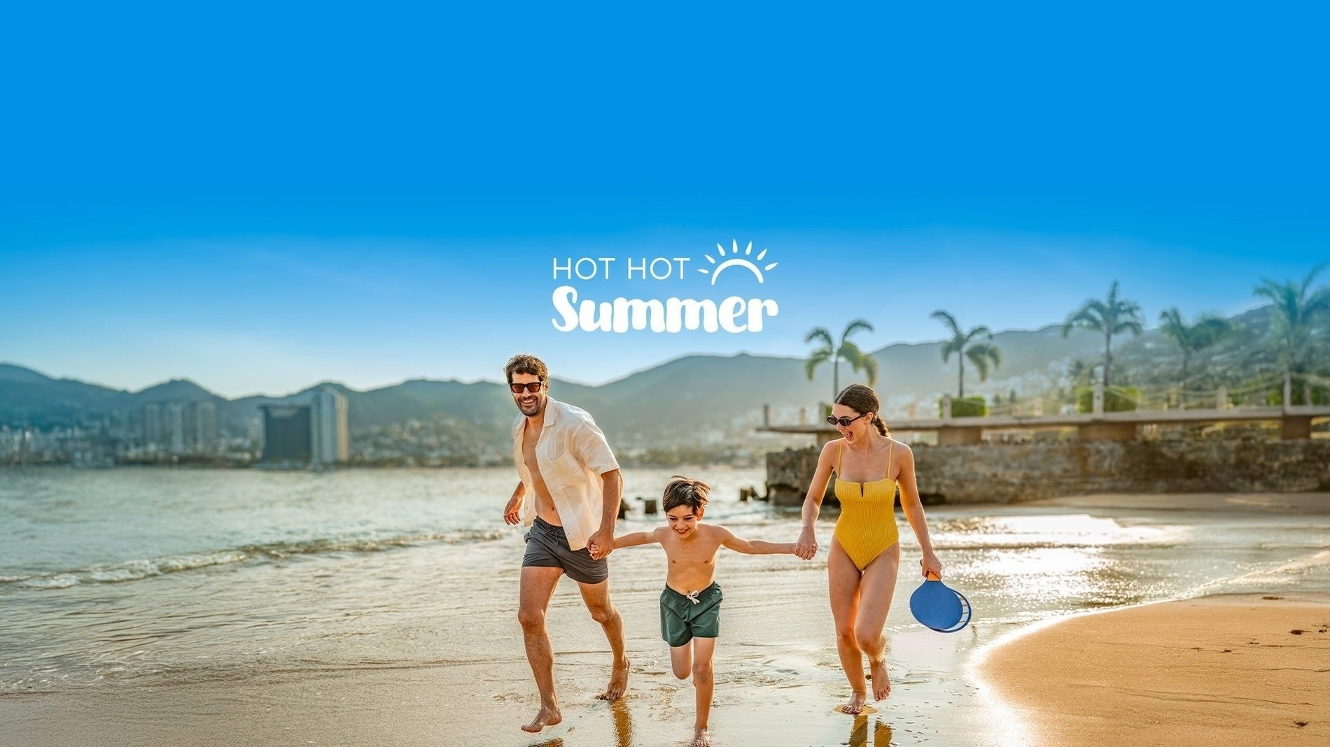 a hot hot summer advertisement with a family on the beach