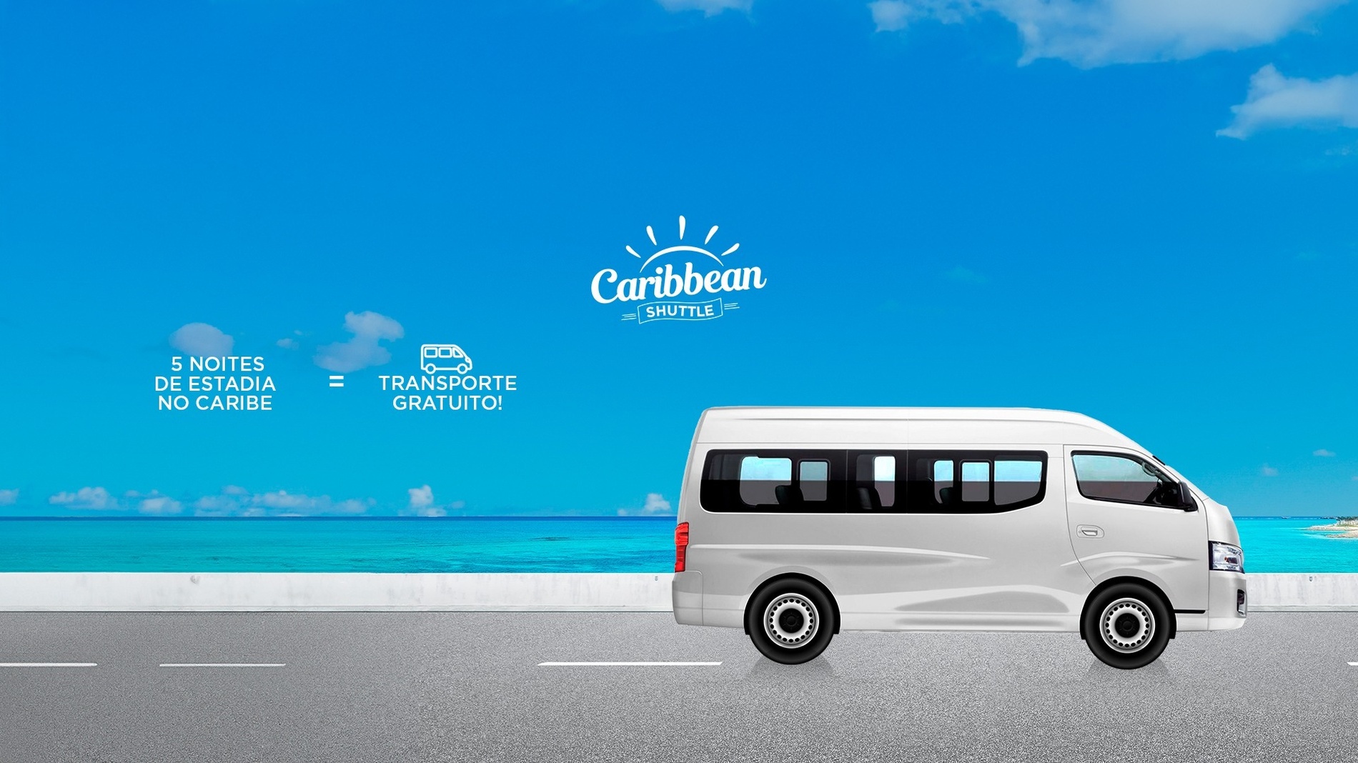 uma van branca está estacionada na beira da estrada ao lado do oceano