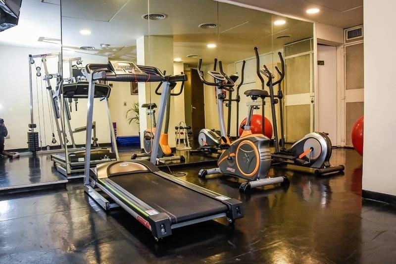 Gym with cardio machines, weights and balls at the Park Royal City Buenos Aires hotel