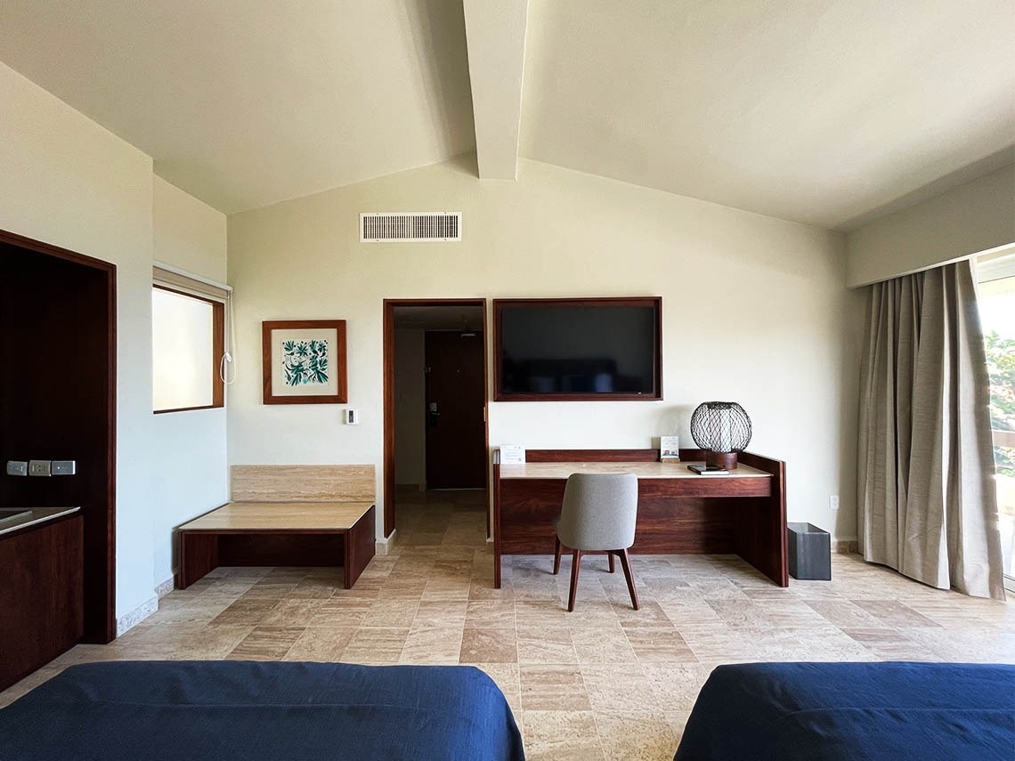 Área de descanso do quarto no The Villas by Grand Park Royal Cancun