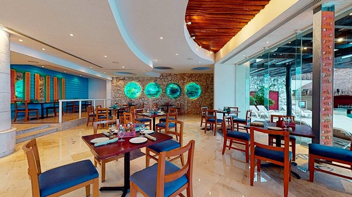 Interior of a restaurant at the Grand Park Royal Cozumel Hotel
