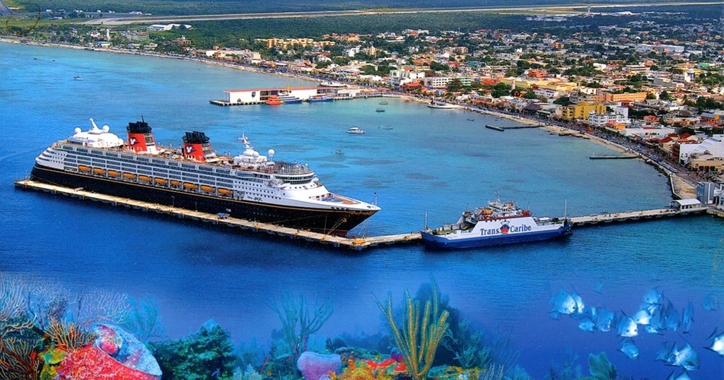 A cruise ship is docked at a dock on the Island of Cozumel