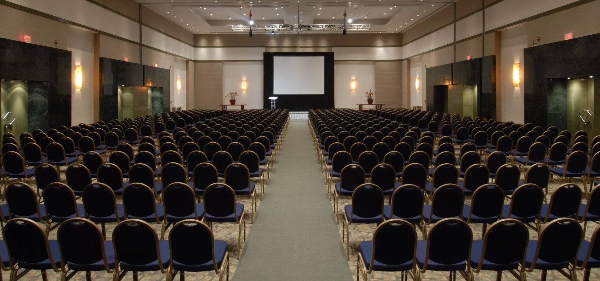 Laguna 2, event room with chairs and lectern at Park Royal Grand Cancun