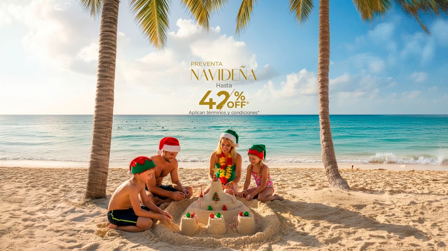 una familia se sienta en la playa y construye un muñeco de arena