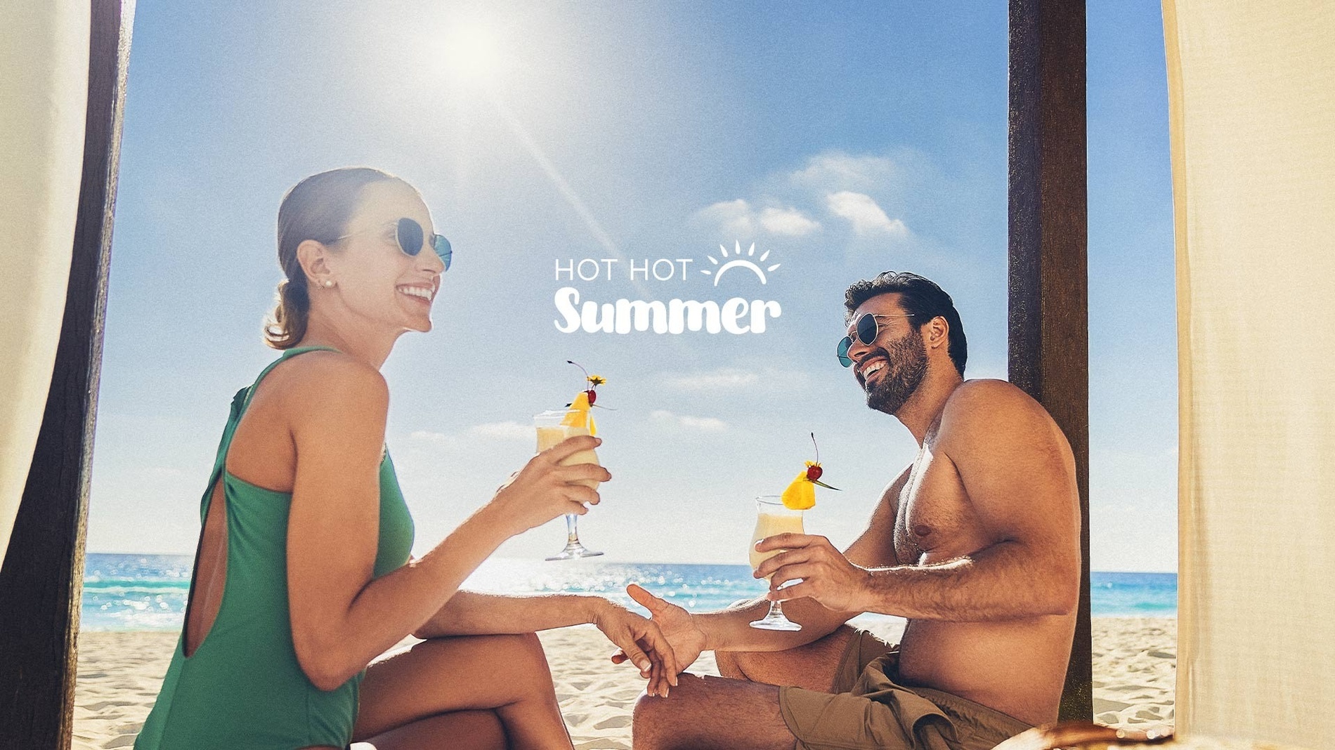 a man and a woman drinking cocktails on the beach with the words hot hot summer behind them