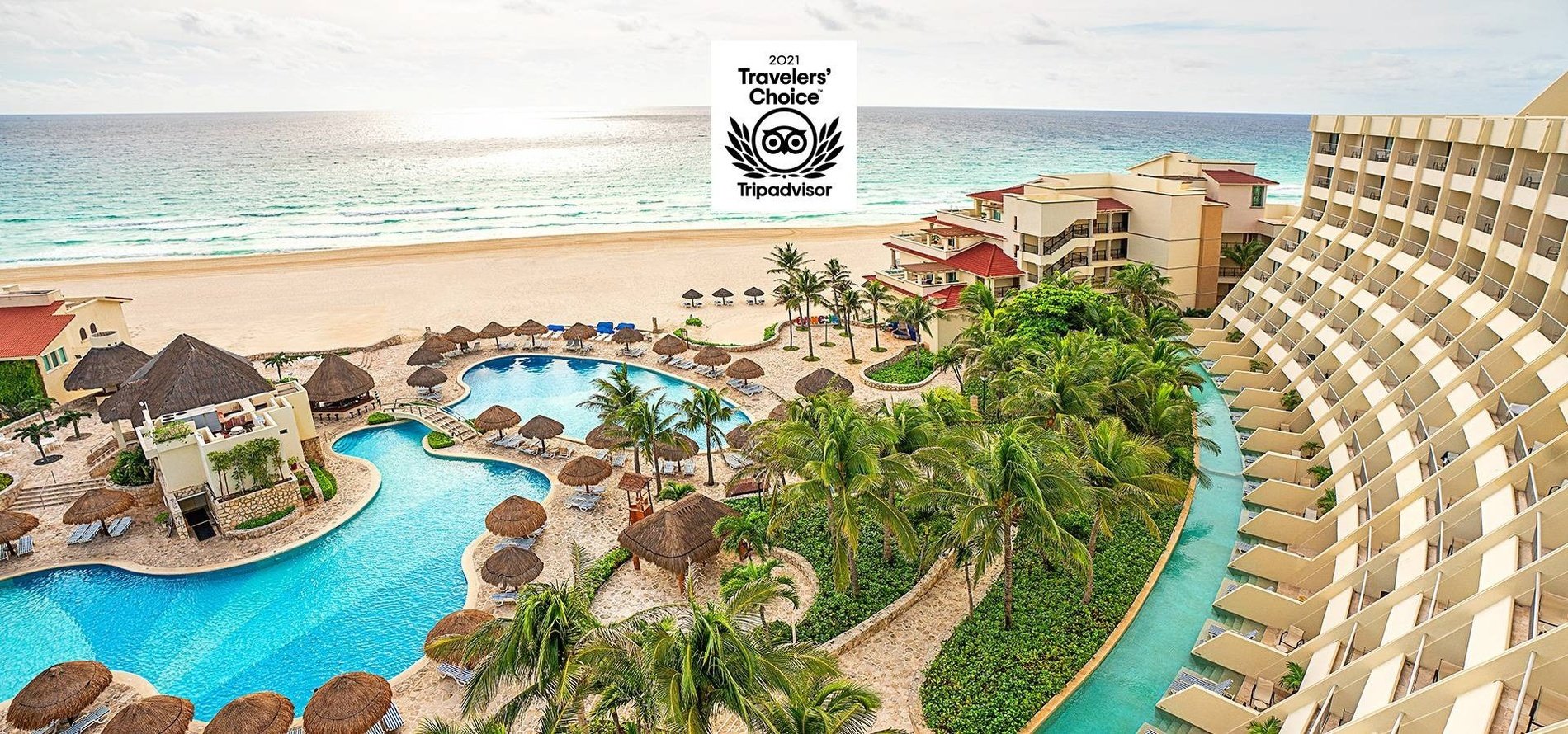 Panoramic view of the Grand Park Royal Cancun Hotel with the TripAdvisor traveler´s choice 2021 Award logo