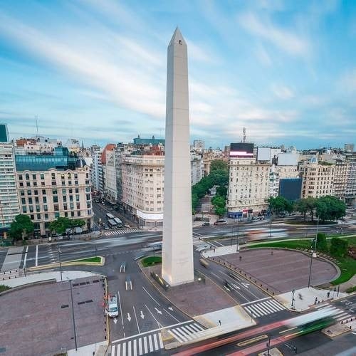 an aerial view of a large obelisk in the middle of a city .