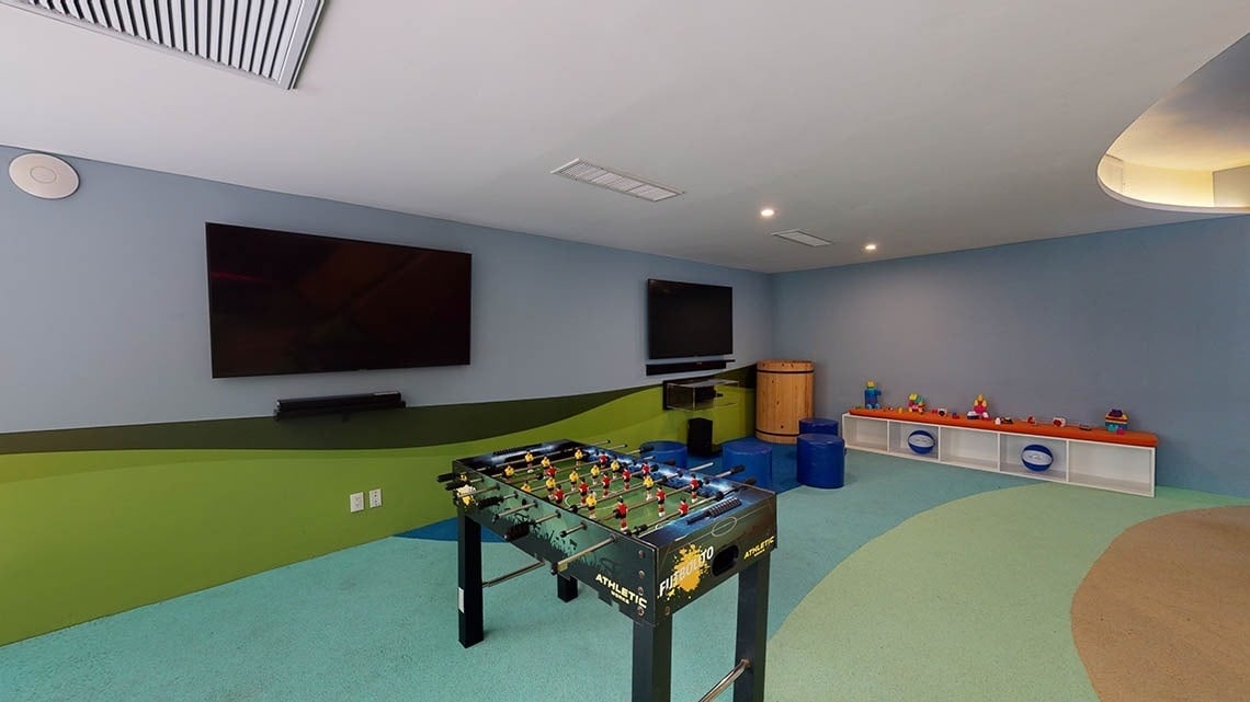 Entertainment area with table football and TV in Hotel Grand Park Royal Puerto Vallarta, Mexico